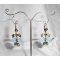 Boucles d'oreilles feuilles bleues avec petits  noeuds et petites noisettes