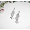 Boucles d'oreilles motif nid d'abeille avec petite abeille en argent