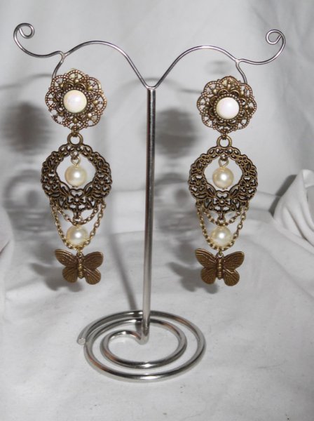 Boucles d'oreilles originales clips avec perles de verre et papillons