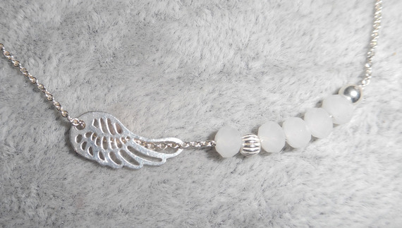 Bracelet original aile et petites perles en cristal blanc sur chaine fine en argent 925