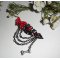 Broche  chien noir et rouge en résine avec petit noeud et chainage noir