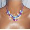 Collier cabochons fleuris multicolores en argile polymère sur cordon en coton ciré violet