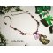 Collier original cheval bronze avec fleurs et cristal rose et mauve