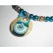 Collier poupée russe avec perles de verre bleu nacré  sur cordon en soie