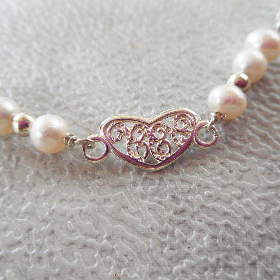 Bracelet en perles de culture avec coeur en argent 925