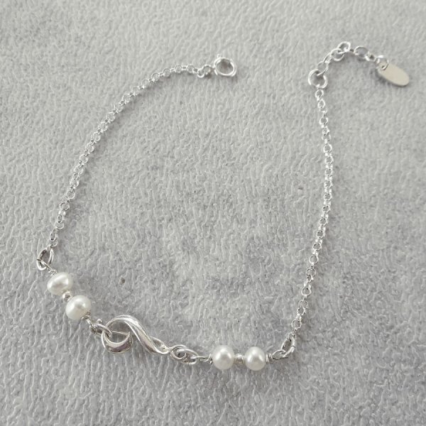 Bracelet en perles de culture avec note de musique en argent 925