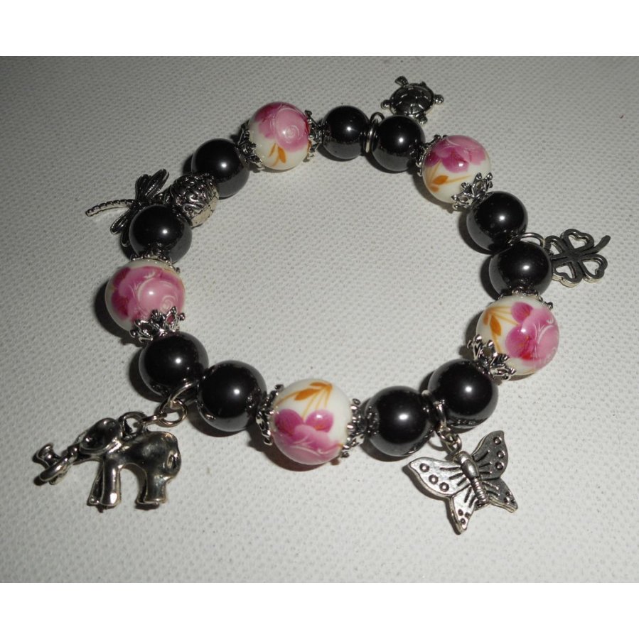 Bracelet en perles de porcelaine et pierres en hématite avec pampilles sur le thème des animaux