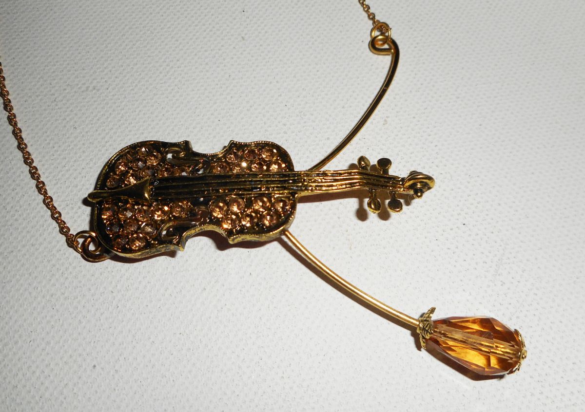 Parure Collier original violon en cristal ambre sur chaine doré