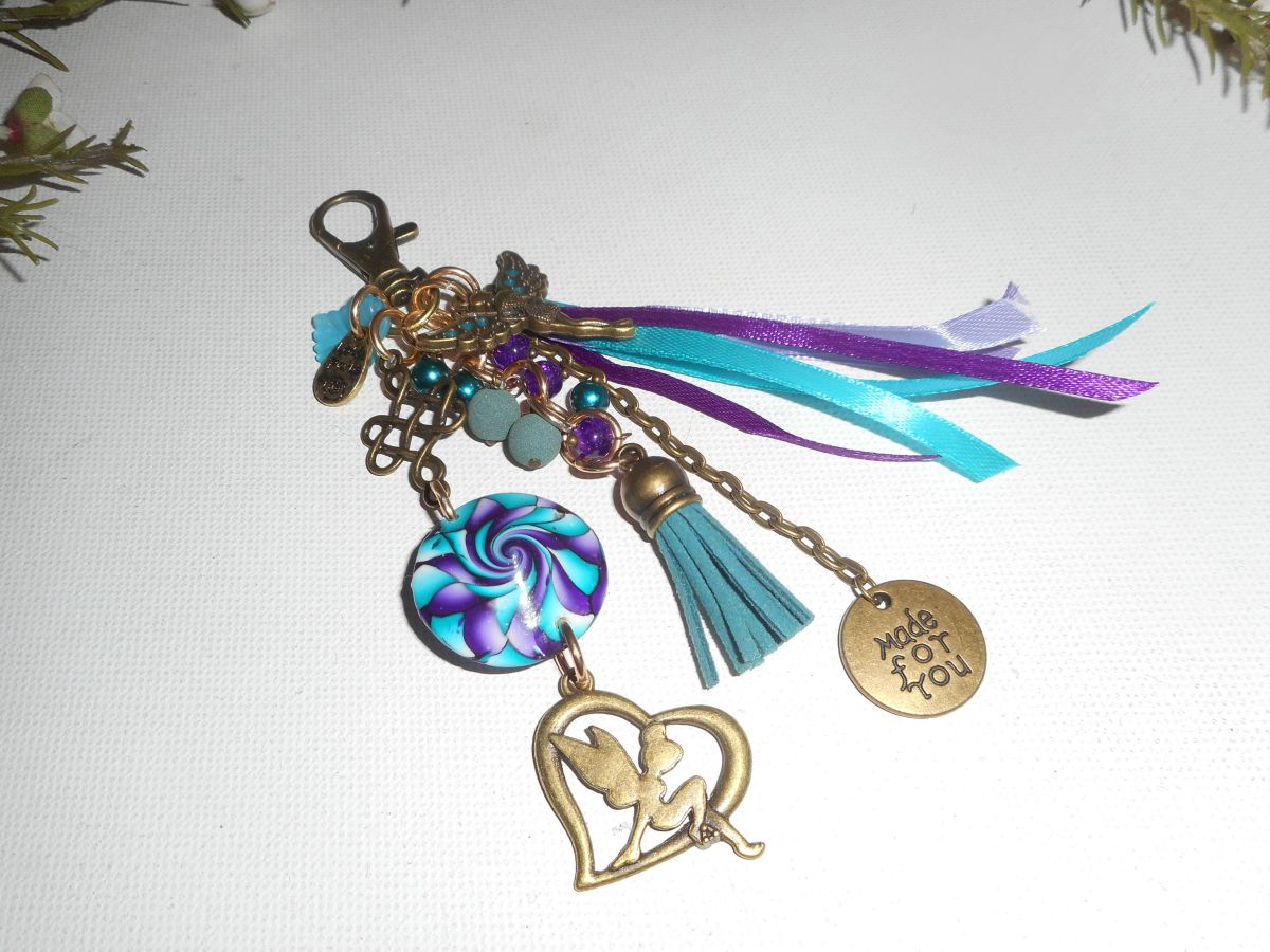 Porte clés/Bijoux de sac fée perles lave et rubans turquoise violet