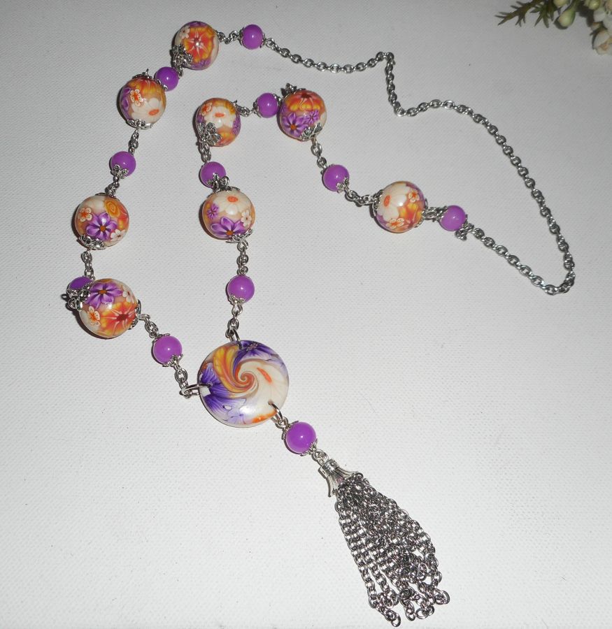 Sautoir en perles d'argile fleuri mauve orange avec pierre de jade coloré
