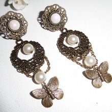 Boucles d'oreilles originales clips avec perles de verre et papillons