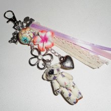 Porte clés/Bijoux de sac ourson avec perles fleuries multicolores et rubans